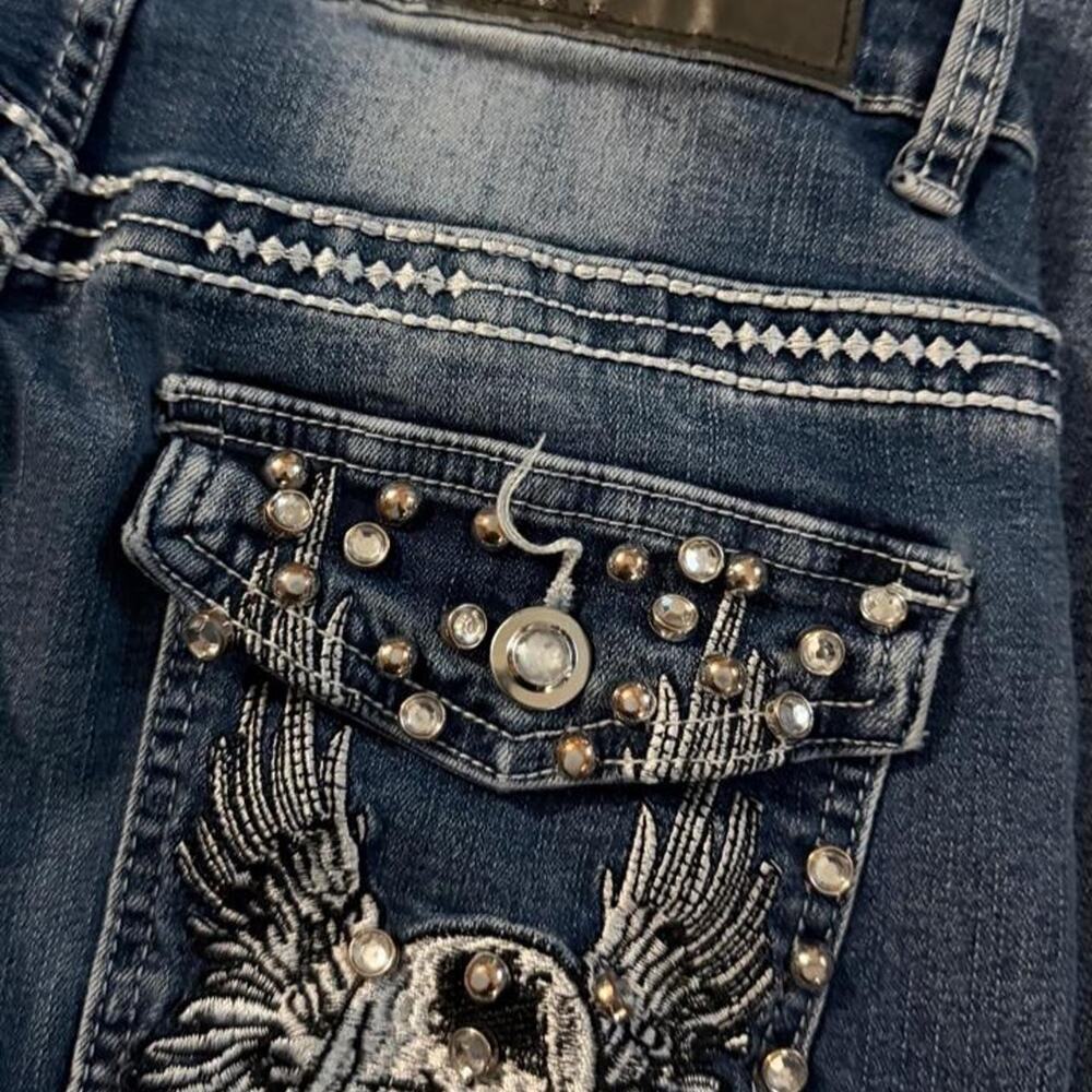 Sky jeans with white skull